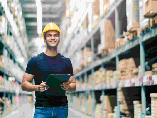 smart-indian-engineer-man-wearing-safety-helmet-doing-stock-tick-check-cardboard-stock-product-management-factory-warehouse-background (1)